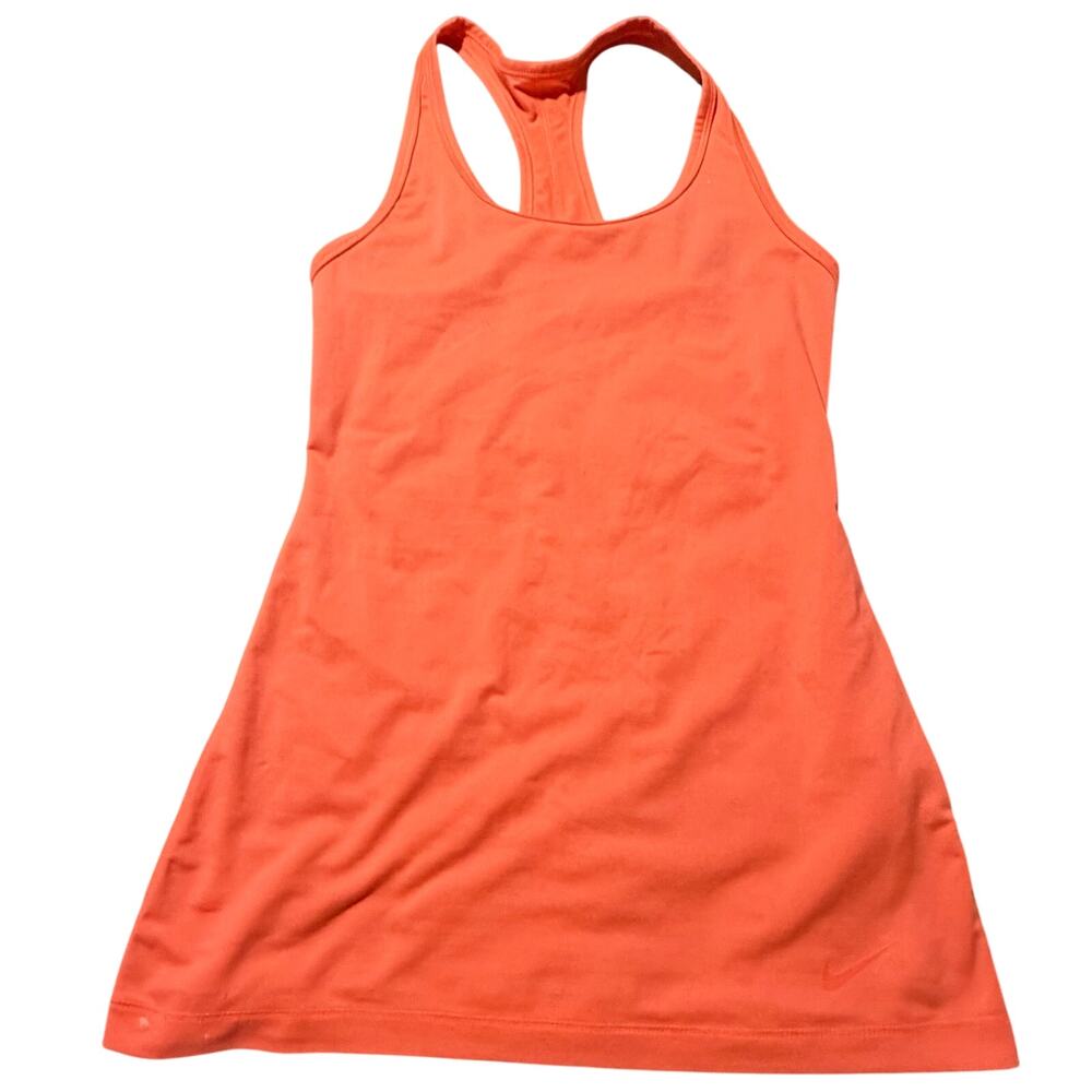 Nike peach top has some wear, some small stains at bottom back cute colorful XS